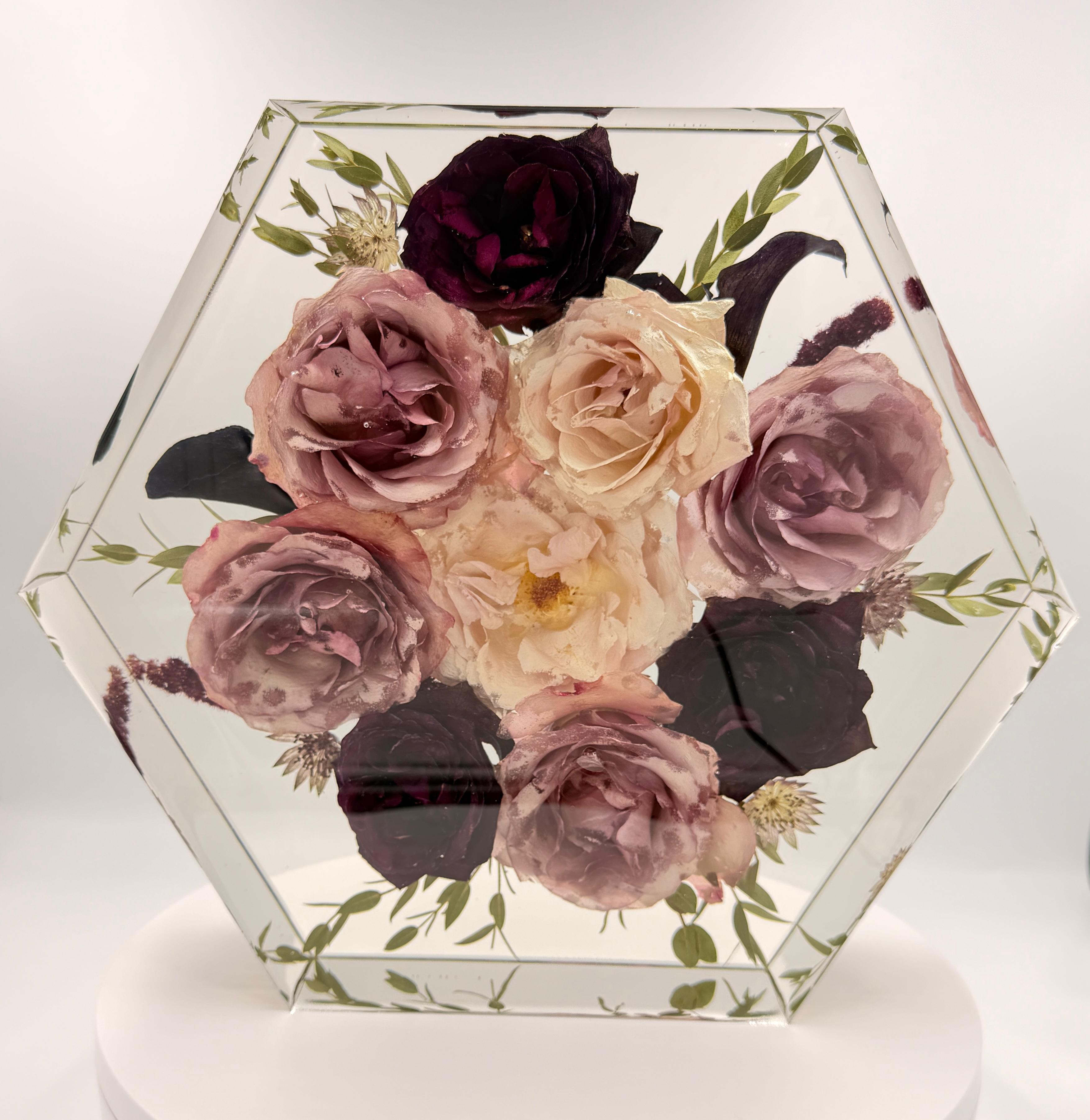 Preserved bouquet in hexagonal resin